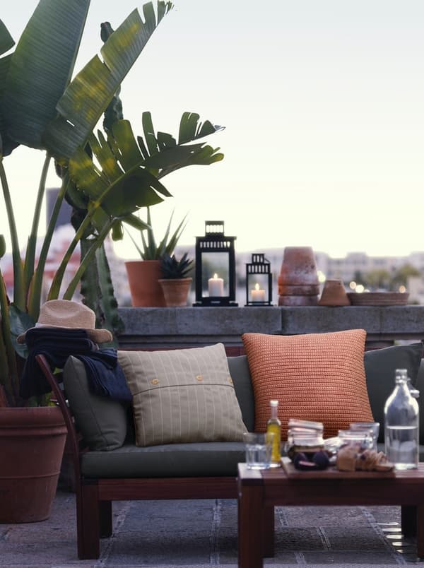 Small terrace with sofa and table for inviting friends