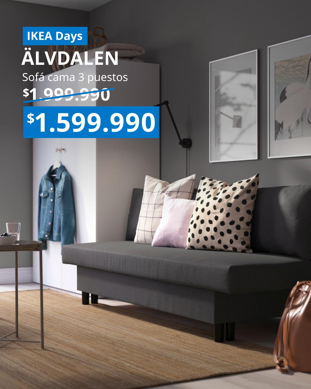 Sofá cama ÄLVDALEN de tres plazas con funda Knisa gris oscuro, ubicado en una sala de estar moderna.