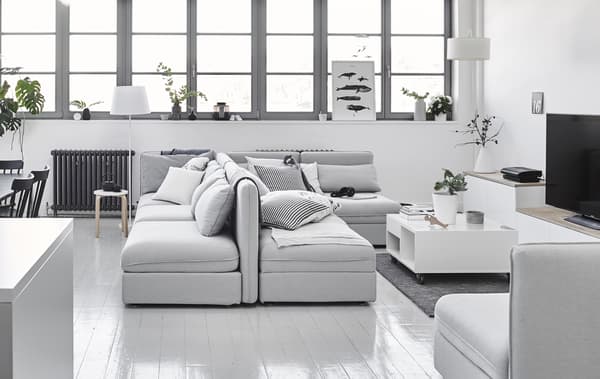 Sofa sections arranged back-to-back.