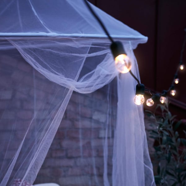 SOLIG canopy net and outdoor string lights