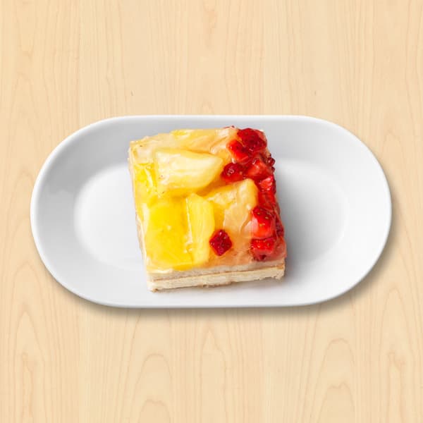 Sommerdrøm
Lagkage med vaniljecreme, frugt og bær – indeholder alkohol

35.-