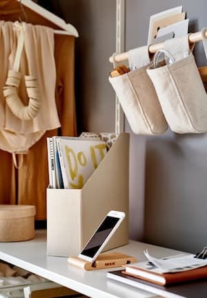 Space-saving storage solutions placed on a desk 