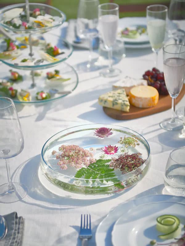 Spring table with glasses and collection of foods outside