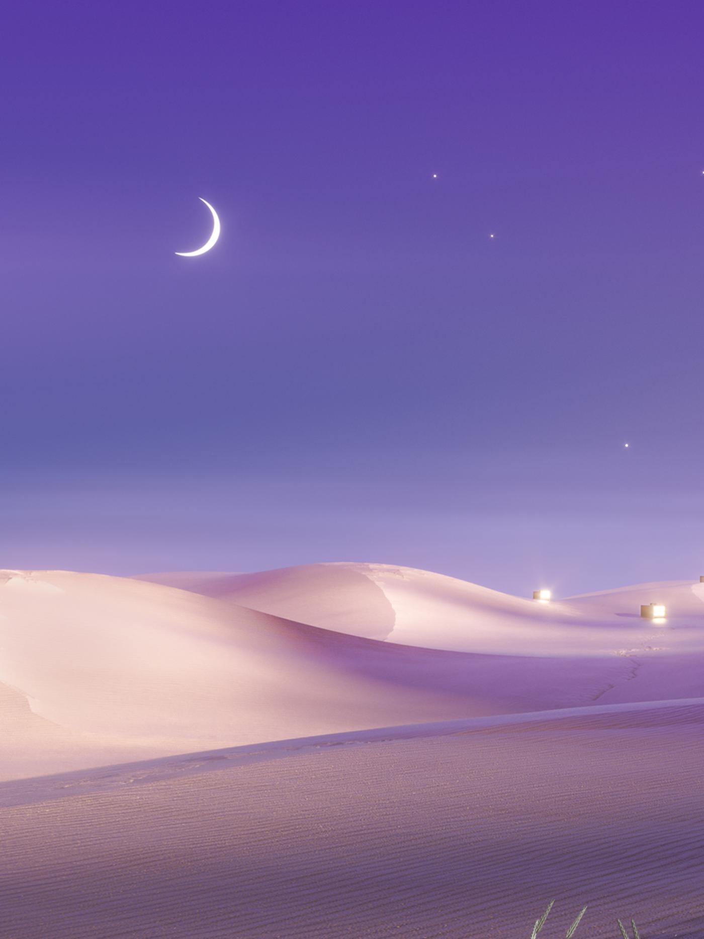 Stars and a crescent moon in a violet-coloured night sky above sand dunes in a desert landscape.