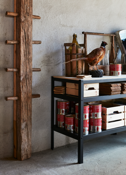 Storage shelves containing ingredents like cans of tomatoes