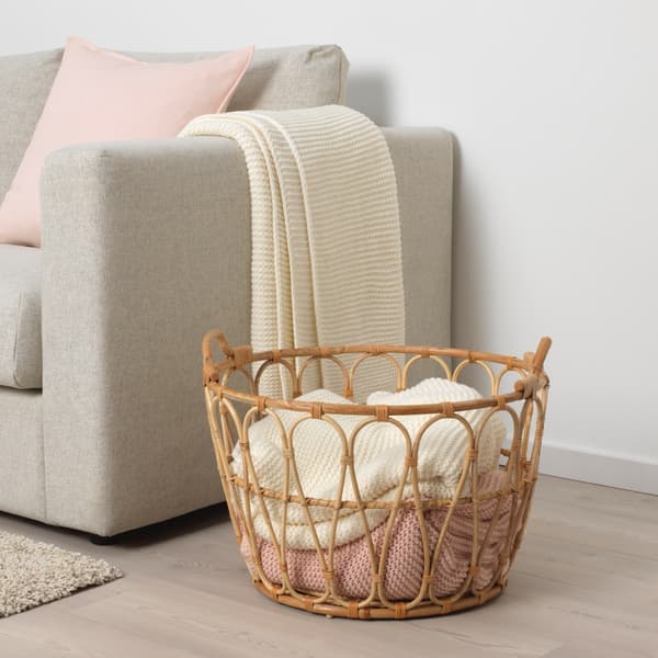 Stylish wicker basket with things.