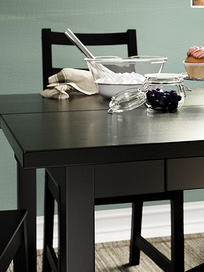Table with mixing bowl and jar of berries