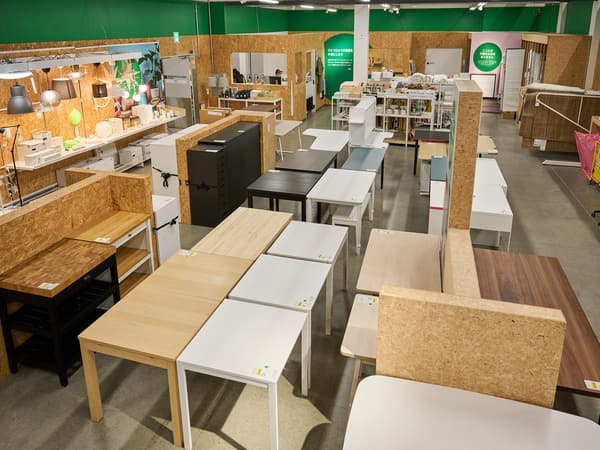 Tables lined up inside a store