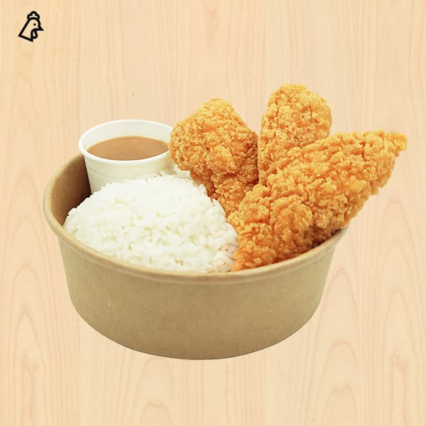 Takeout bowl with white rice, crispy golden fried chicken tenders, and a cup of brown gravy on a light wood background; appetizing tone.