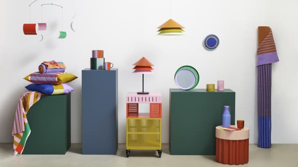 TESAMMANS Collection displayed on coloured risers.