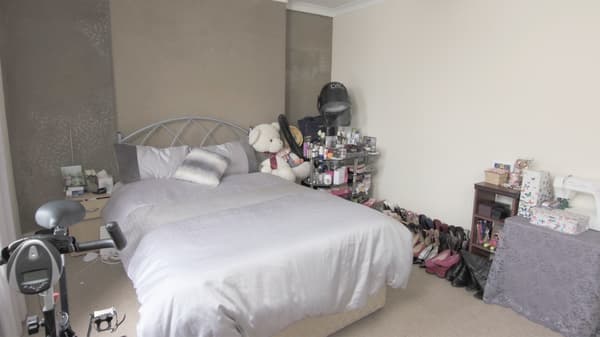 The bedroom was lacking storage and was cluttered was little floor space and it felt disorganised,