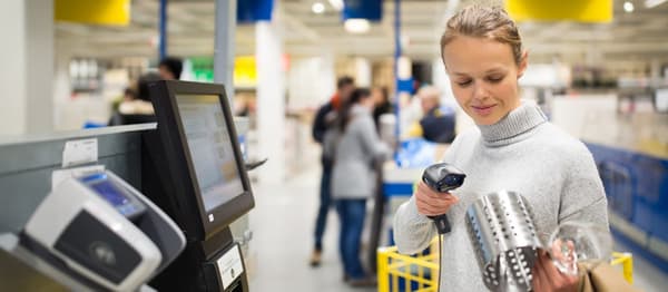 The customer scans the product in an IKEA store.
