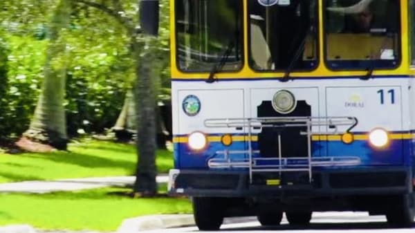 The front of a Doral City Trolley.
