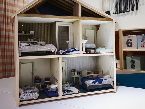 The full doll's house with four rooms and an attic