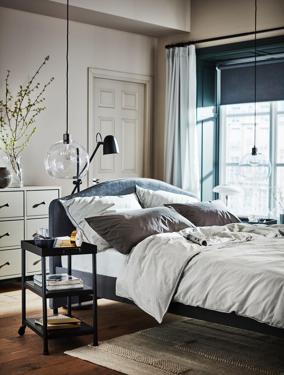 The head of a HAUGA upholstered bed frame.