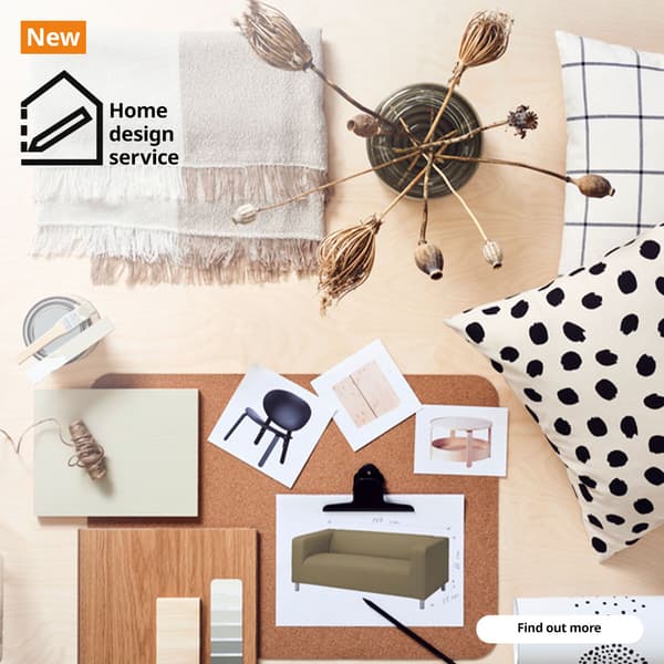 The image shows a flat lay of various home design elements arranged on a light wood surface. The central focus is a corkboard displaying sketches of furniture (a sofa, chair, and coffee table), alongside samples of wood, paint, and fabric swatches. A 'New' tag with a logo for "Home design service" is located on the top left overlay the image. 