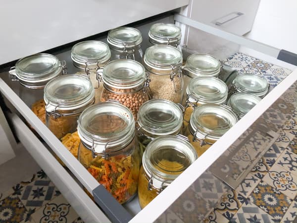 The kitchen drawer with well-organised food jars