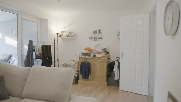 The living room was mostly used for laundry and ironing. The large sofa took almost half of the floor space