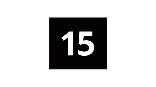 The number 15 is in white letters in a black square box.