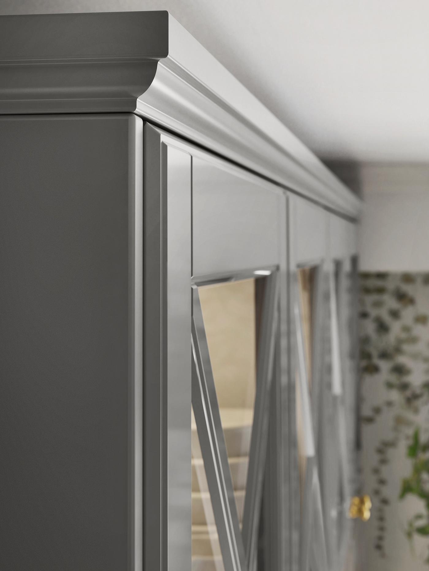 The top corner of a row of grey kitchen cabinets with glass doors and a matching contoured decorative moulding on top.