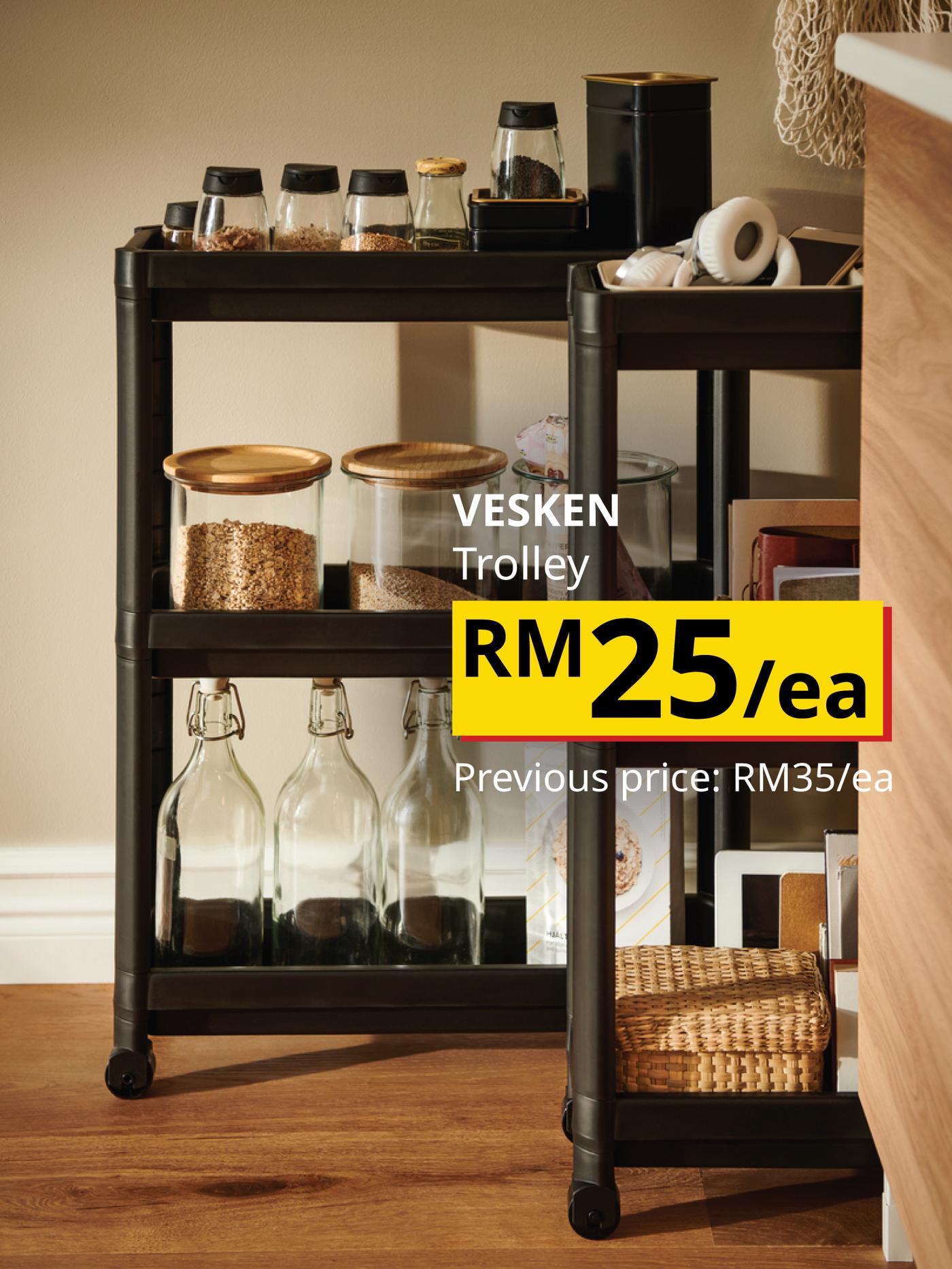The visual features a black VESKEN trolley with wheels, holding jars, bottles and kitchen essentials, priced at RM25 each, previously RM35 each.