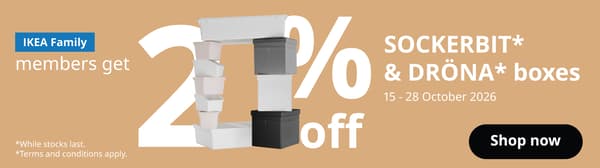 The visual features stacked white, grey, pink and black storage boxes against a beige background, with large white text reading “20% off”. The text reads: “IKEA Family members get 20% off SOCKERBIT* & DRÖNA* boxes, 15–28 October 2026.” It also states “While stocks last” and “Terms and conditions apply”, with a black “Shop now” button on the right.