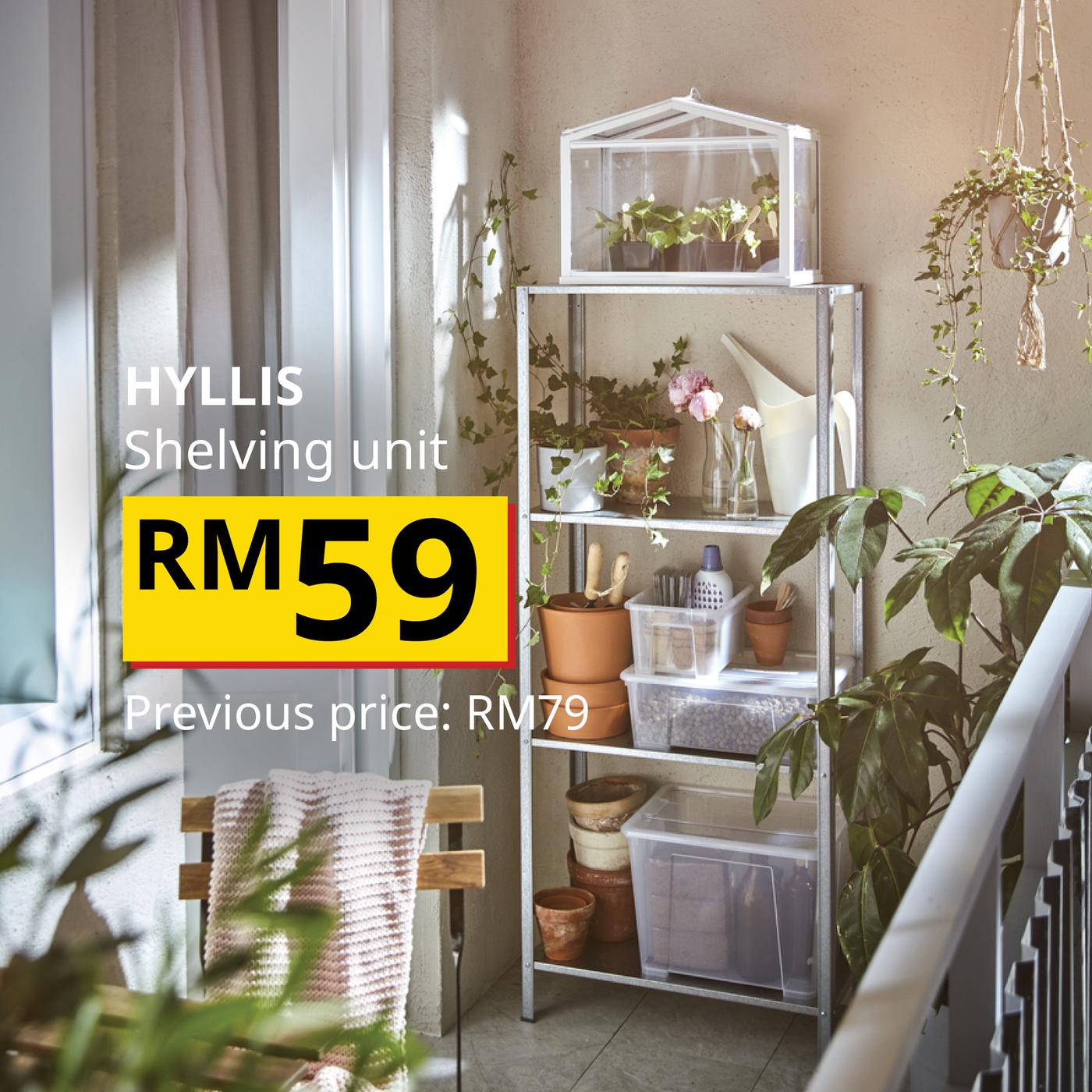 The visual shows a HYLLIS shelving unit filled with plants, storage boxes and other home accessories near a window. The text reads: “HYLLIS Shelving unit, RM59. Previous price: RM79.”