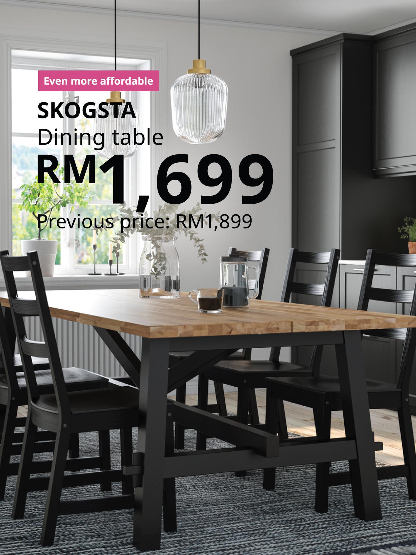 The visual shows a wooden SKOGSTA dining table with black chairs in a modern dining room. The text reads: “Even more affordable. SKOGSTA dining table, RM1,699. Previous price: RM1,899.”