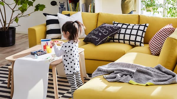 The yellow IKEA VIMLE three seat sofa brings lots of comfort and a little sunshine into your living room.