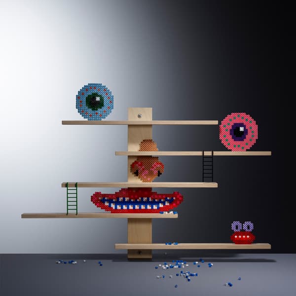 These flexible and multifunctional IKEA LUSTIGT shelves can easily be moved sideways, or used to display favorite toys.