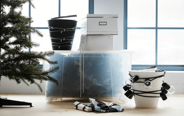 Time to pack and store your holiday decorations? IKEA has a lot of smart storage and organisation ideas for small spaces. Put big and awkward-shaped items inside a big transparent storage box and wind your lighting chain round a bin.