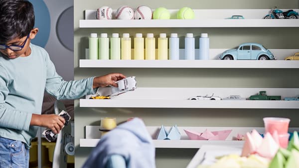 Tips and ideas for kids' storage that children can use themselves to keep their things tidy and organised.