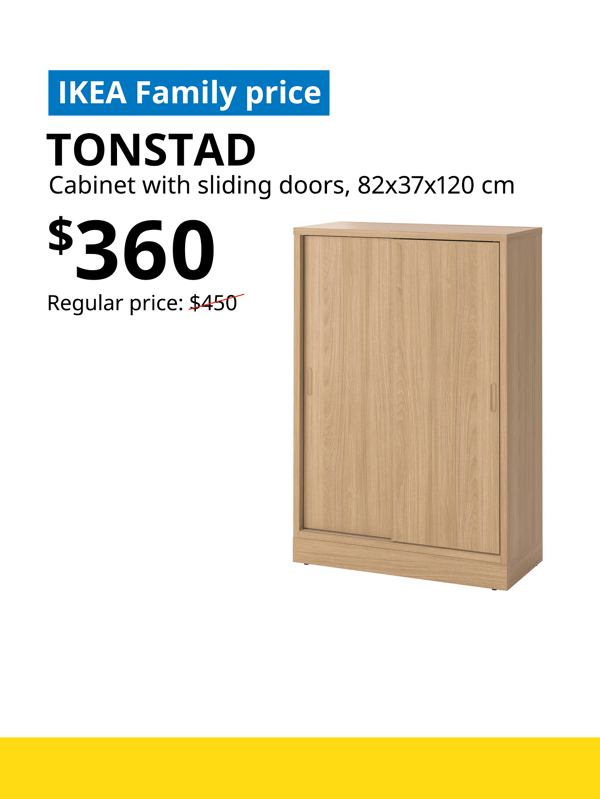 TONSTAD cabinet with sliding doors in oak colour, words on image read "IKEA Family price, TONSTAD, cabinet with sliding doors, 82x37x120 cm, $360, Regular price: $450 with a slash. 