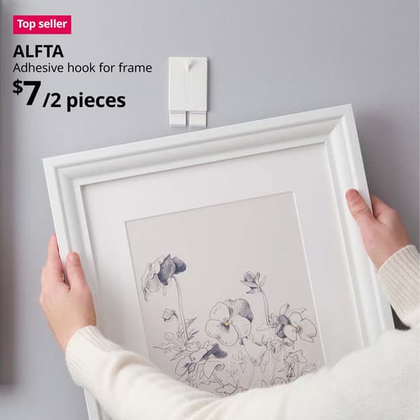 Top seller tag. ALFTA adhesive hook for frame, white. $7/2 pieces