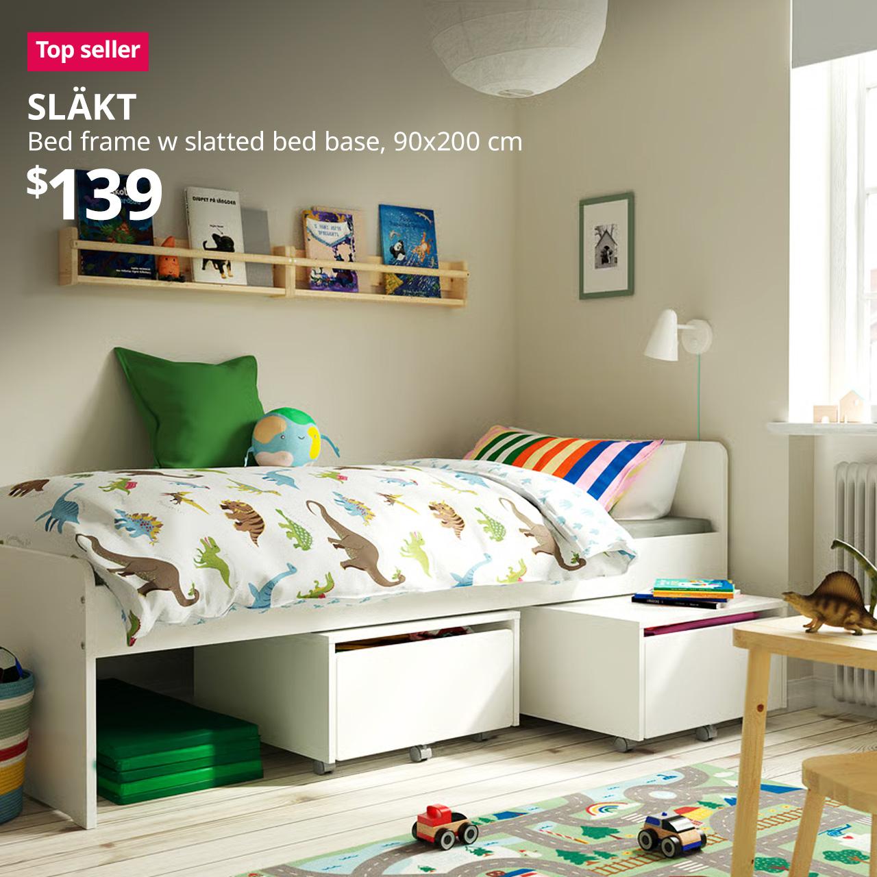 Top seller tag. SLÄKT bed frame with slatted bed base, white, 90x200 cm, in a children's room. Price: $139