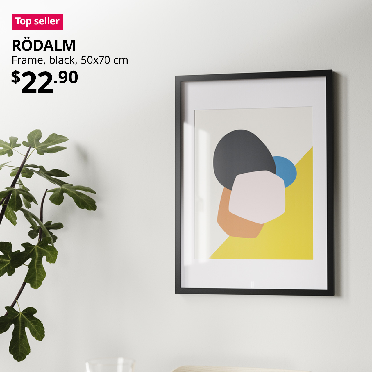 Top seller tag. White wall featuring RÖDALM frame, black, 50x70 cm, $22.90.