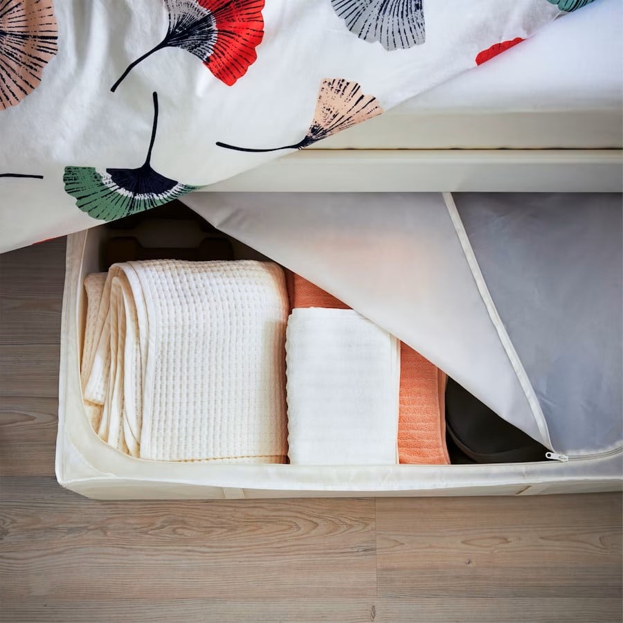 towels-stored-in-a-zip-cover-box-under-the-side-of-a-bed-