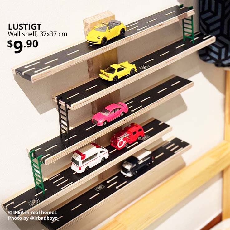 Toy cars on LUSTIGT wall shelf, 37x37 cm, in children's room. Price: $9.90