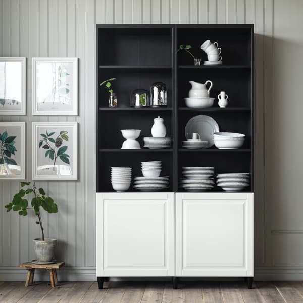 Traditional BESTÅ storage unit with cookware and tableware