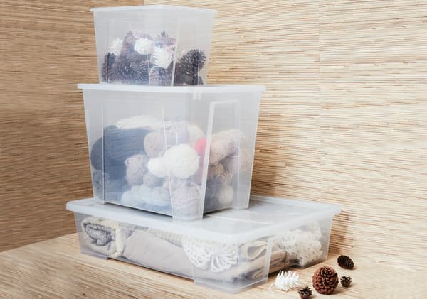 Transparent plastic stackable containers of various sizes.