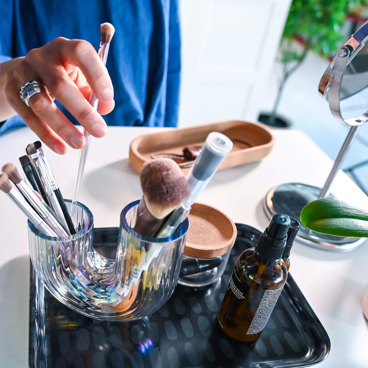 Tray with makeup brushes