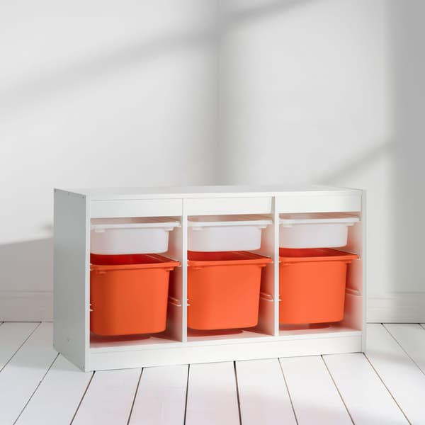 TROFAST boxes that are filled with toys are placed in TROFAST frames.