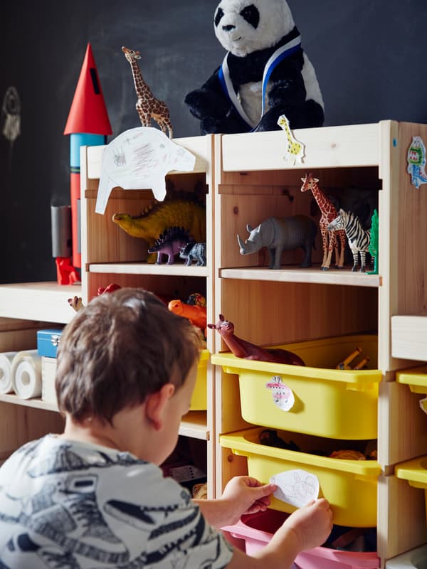 TROFAST toy storage with yellow baskets