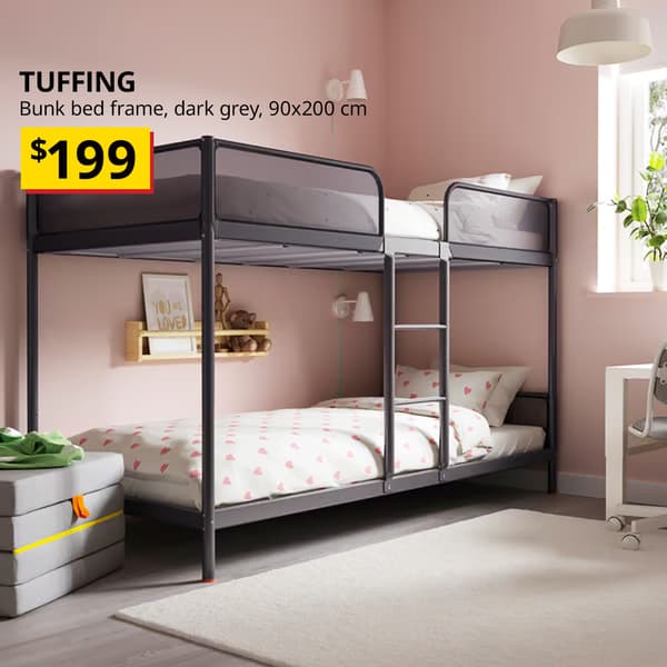 TUFFING bunk bed frame, dark grey, 90x200 cm, in a children's room and dark grey SLAKT foldable mattress placed at foot of the bed. Price: $199