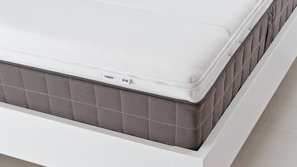 TUSSÖY white mattress pad.