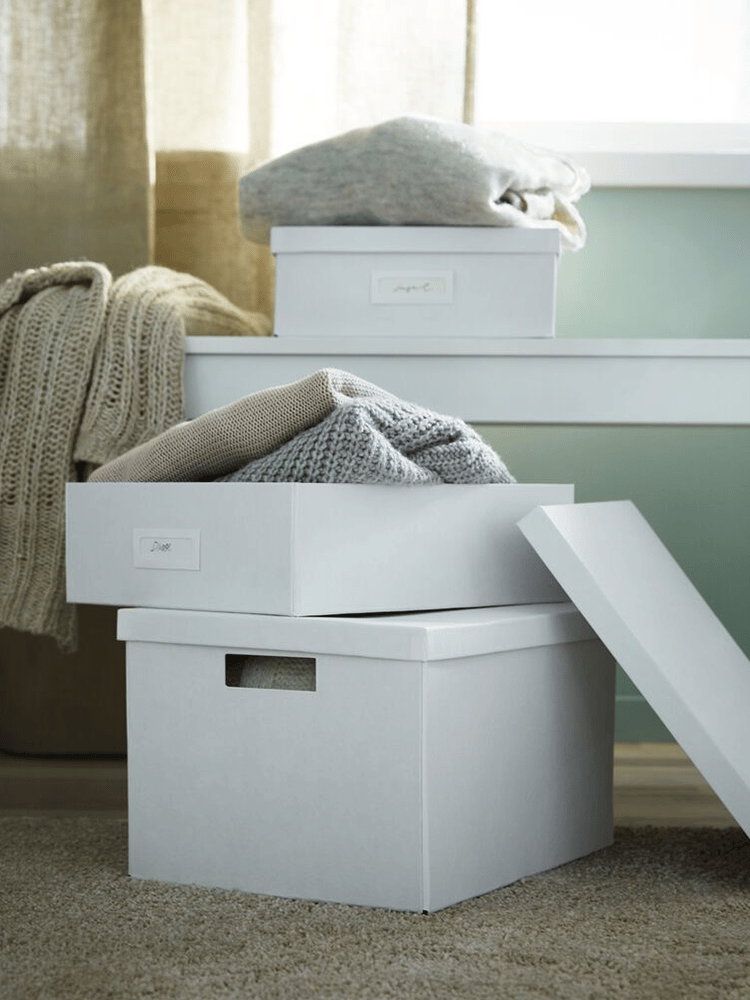 Two boxes full with clothes