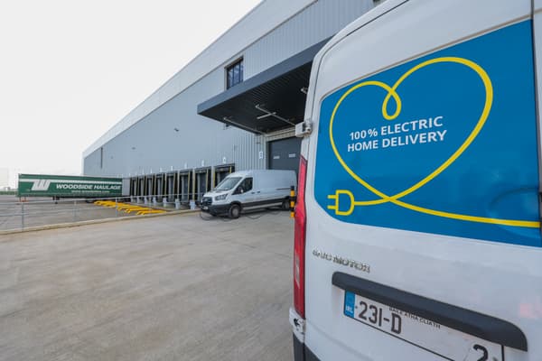 Two delivery vans parked outside the distribution centre
