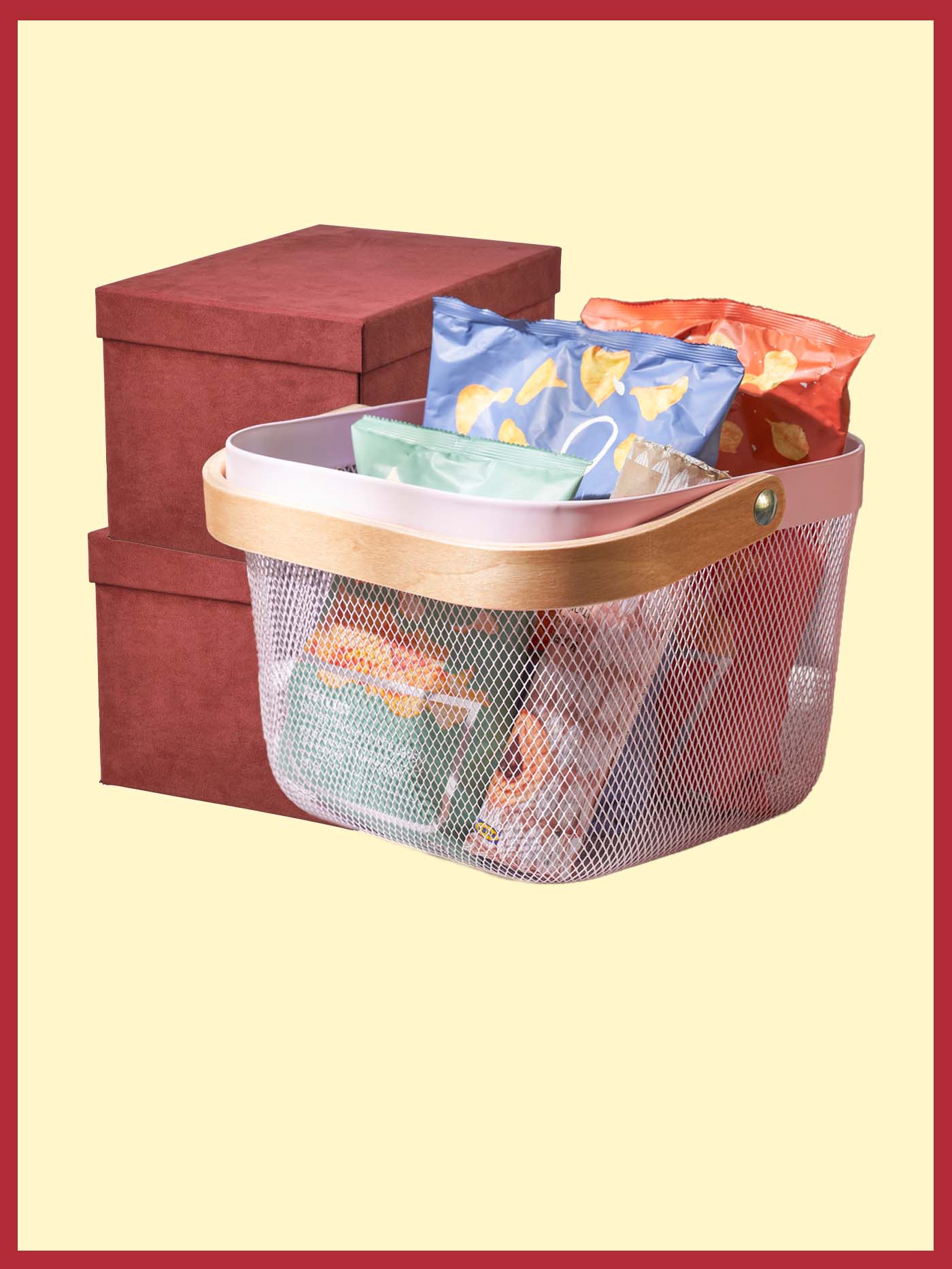 Two GJÄTTA storage box with lid and pink RISATORP basket filled with snacks for Chinese New Year