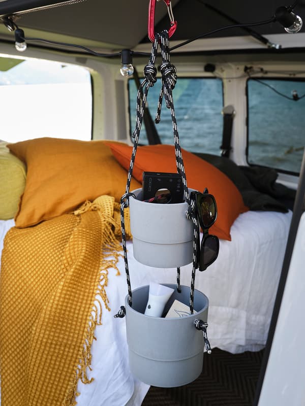 Two hanging pots hung inside the van
