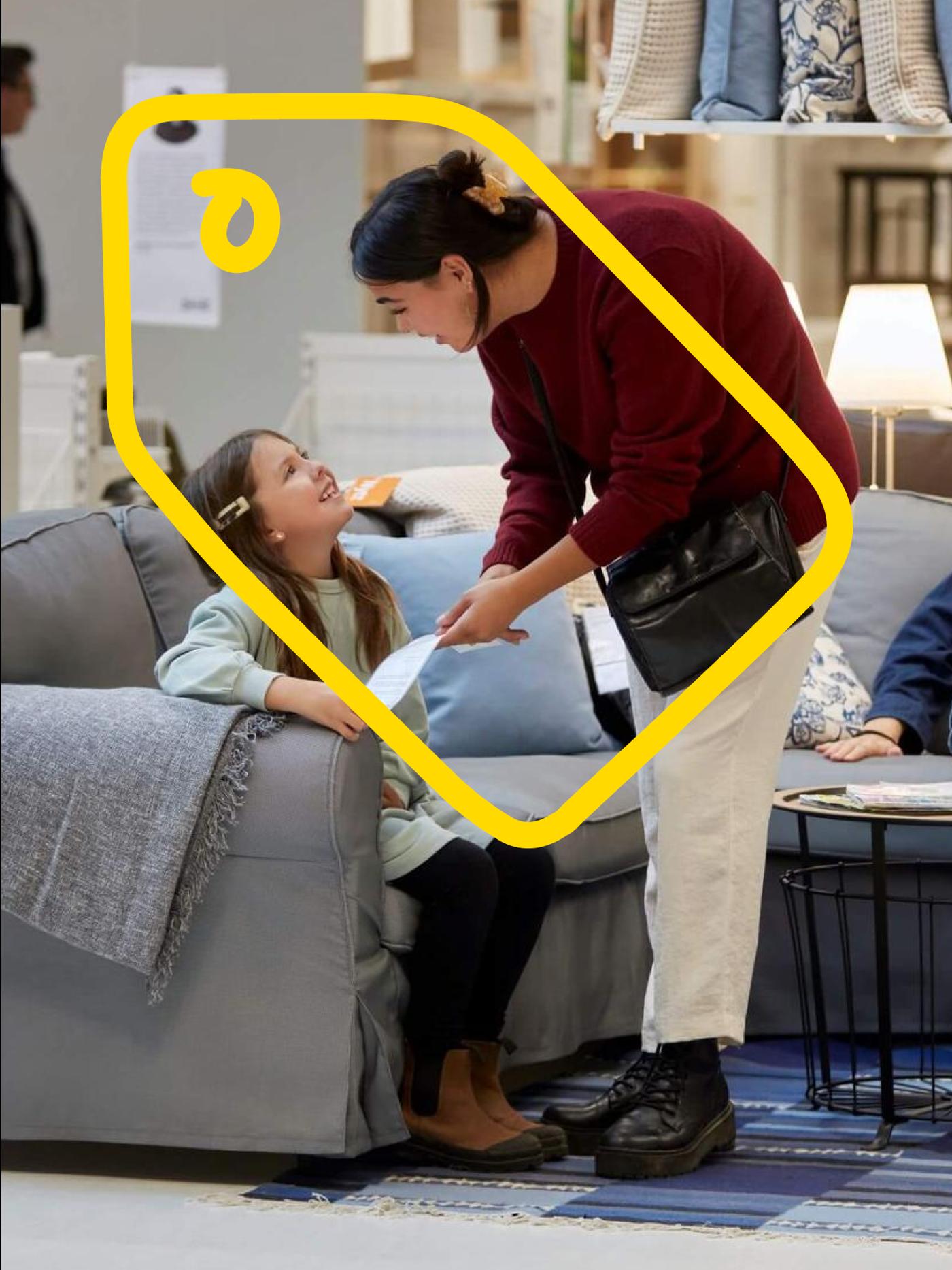 Two people shopping in IKEA store.